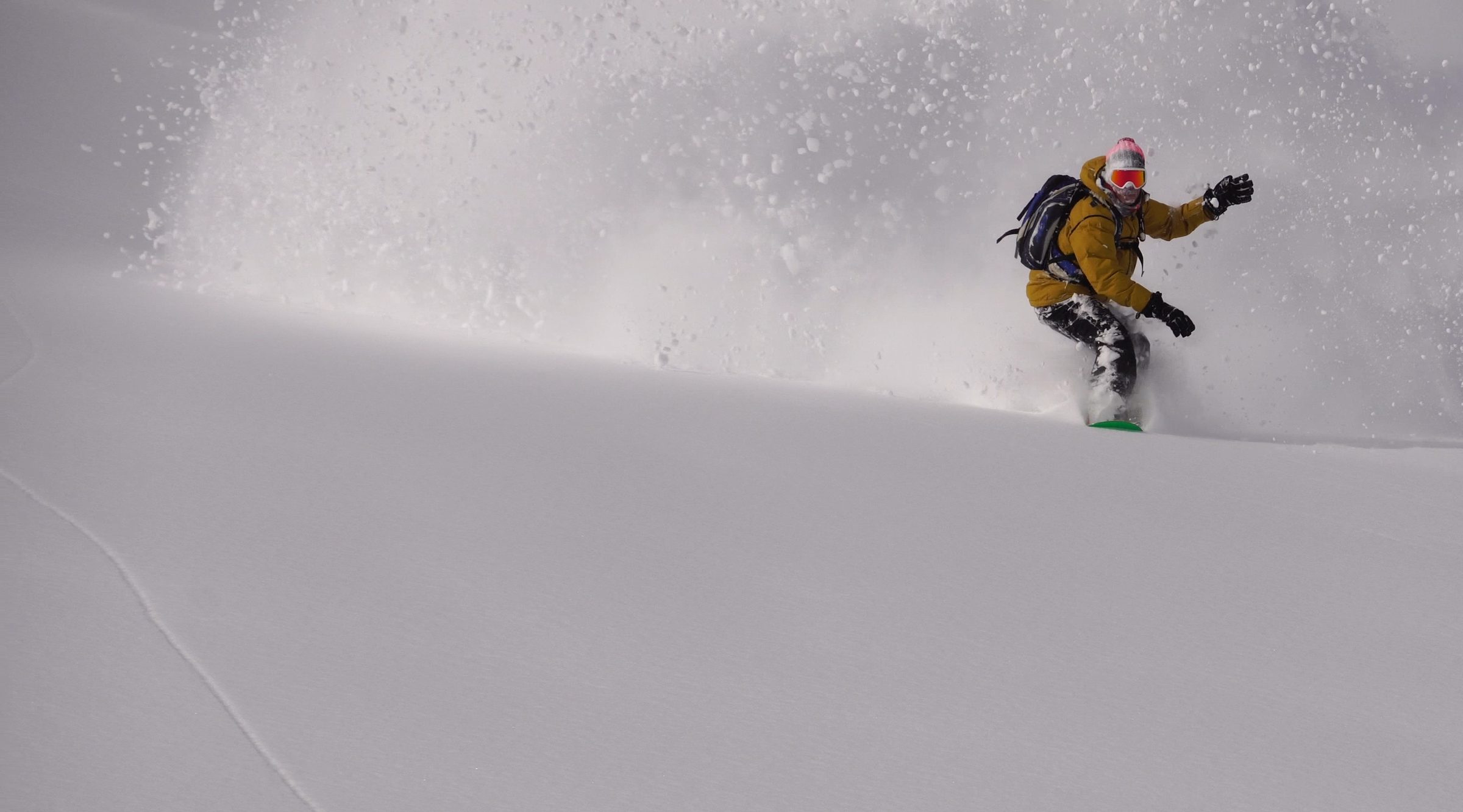 Snowboarder em neve powder — 24/7 Freeride Davos